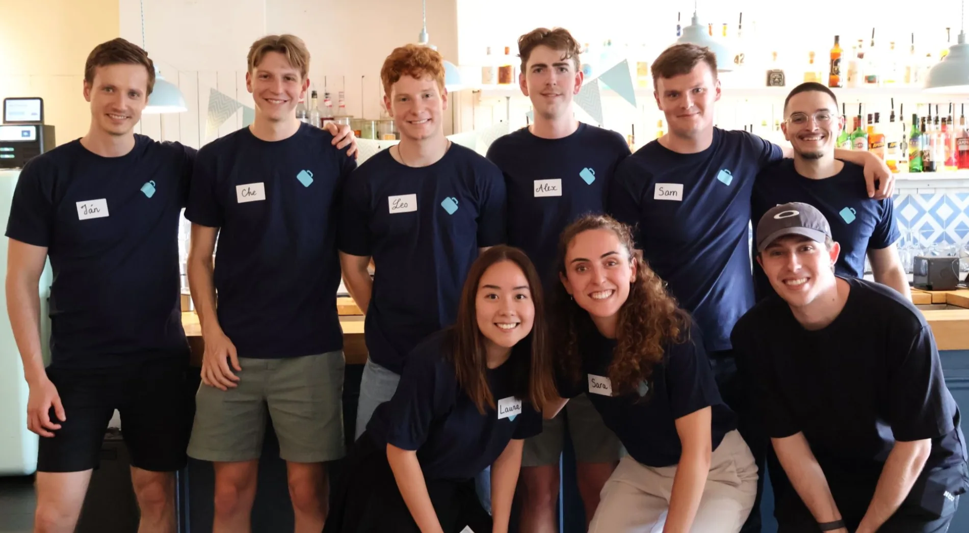 The Briefcase team together in navy Briefcase T-shirts